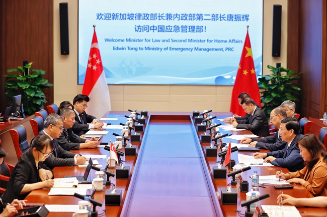 王祥喜會見新加坡律政部長兼內政部第二部長唐振輝